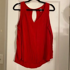 Red v neck sleeveless blouse w/ key hole